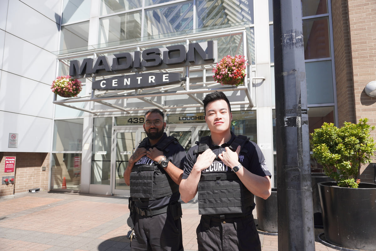Blackbird security guards standing in front of retail shopping mall