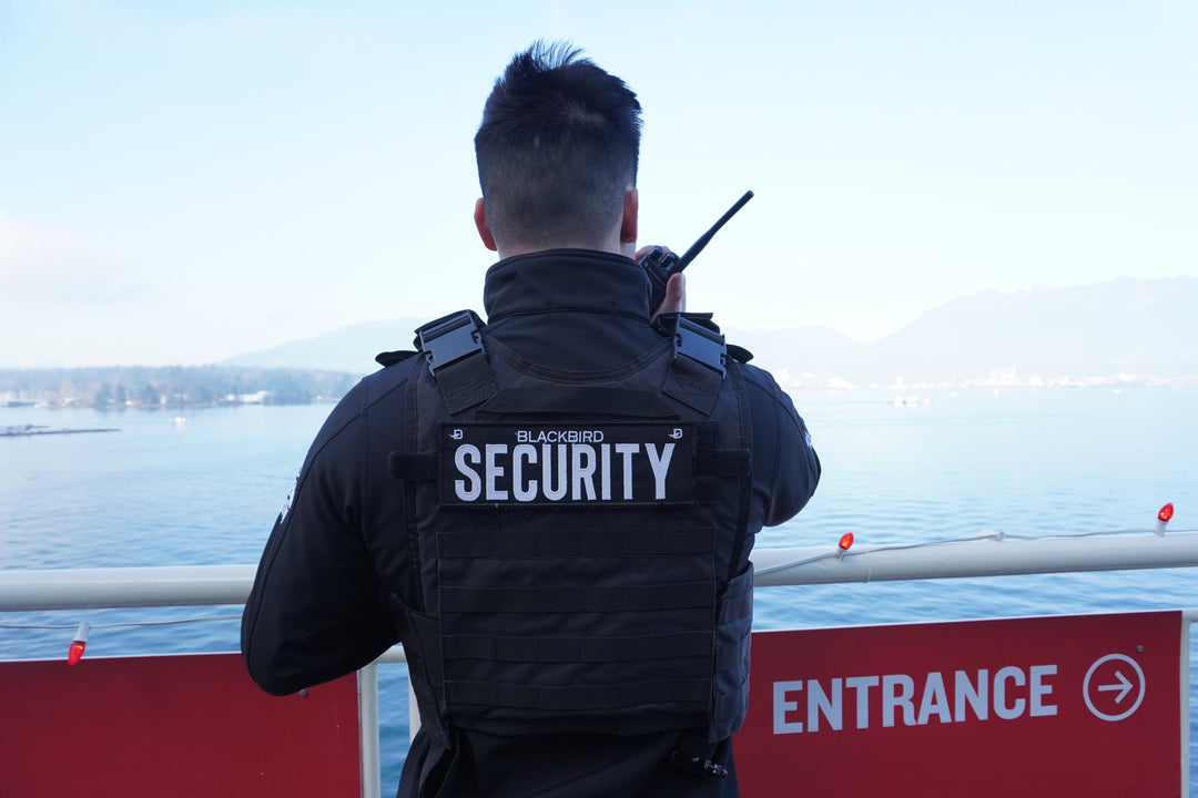 Blackbird Security guard stands at Waterfront in Vancouver
