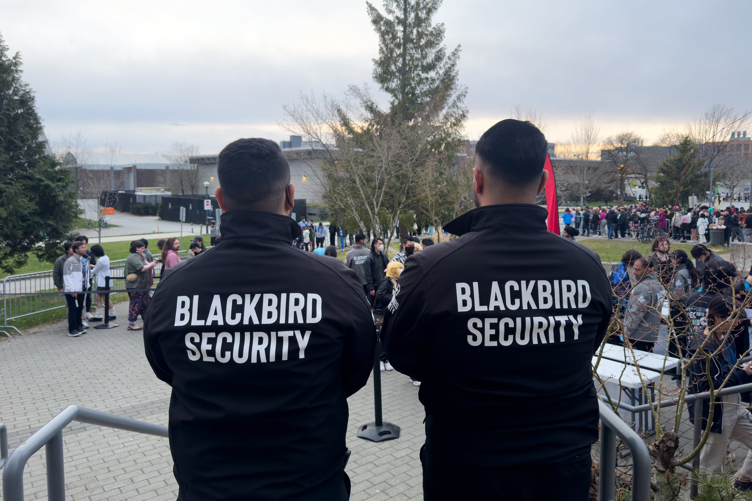 Blackbird Security Event Security Guards overseeing bag checks in the lineup for a Hatsune Miku concert in Vancouver, BC