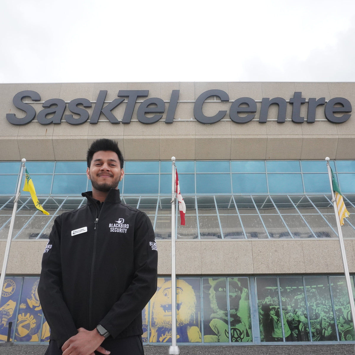 Blackbird Security Uniform Guard Standing by the SaskTel Centre in Saskatoon